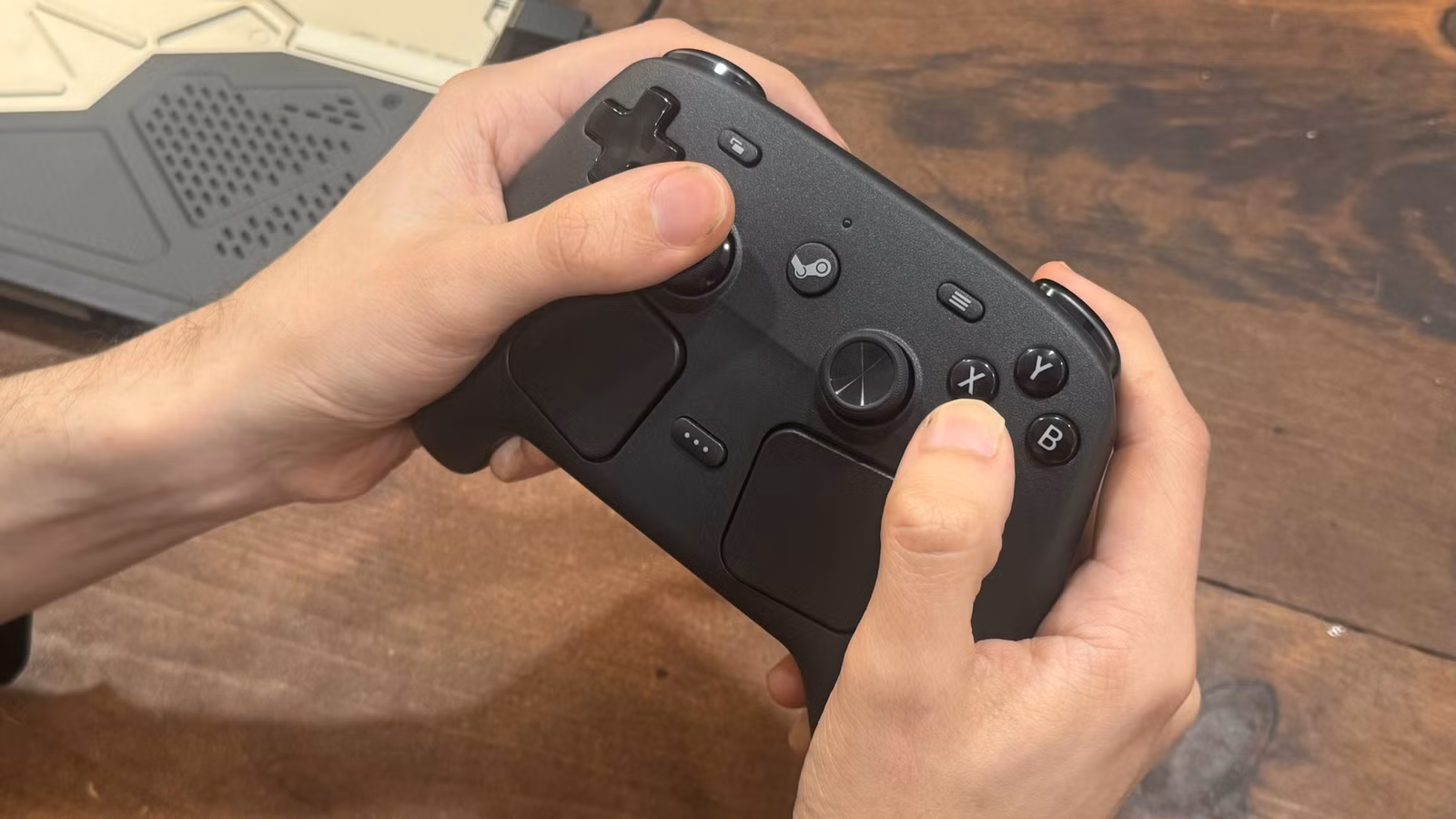 hands-holding-steam-controller.jpg